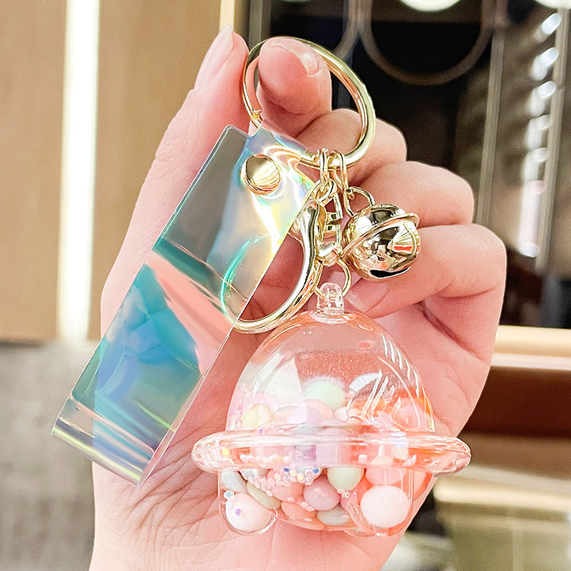 Wholesale Acrylic Fueled Spaceship Astronaut Luminous Quicksand Bottle Keychain